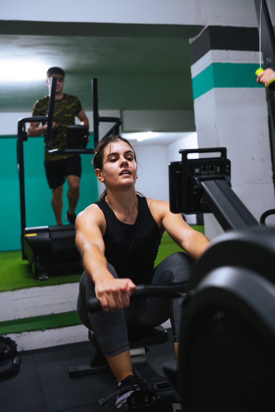 Athlete on a rowing machine during a training session